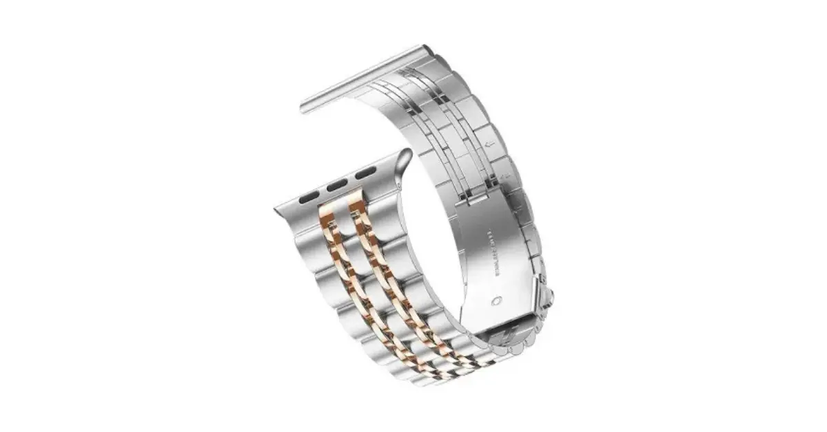 Silver and gold Apple Watch band close-up with stainless steel shine
