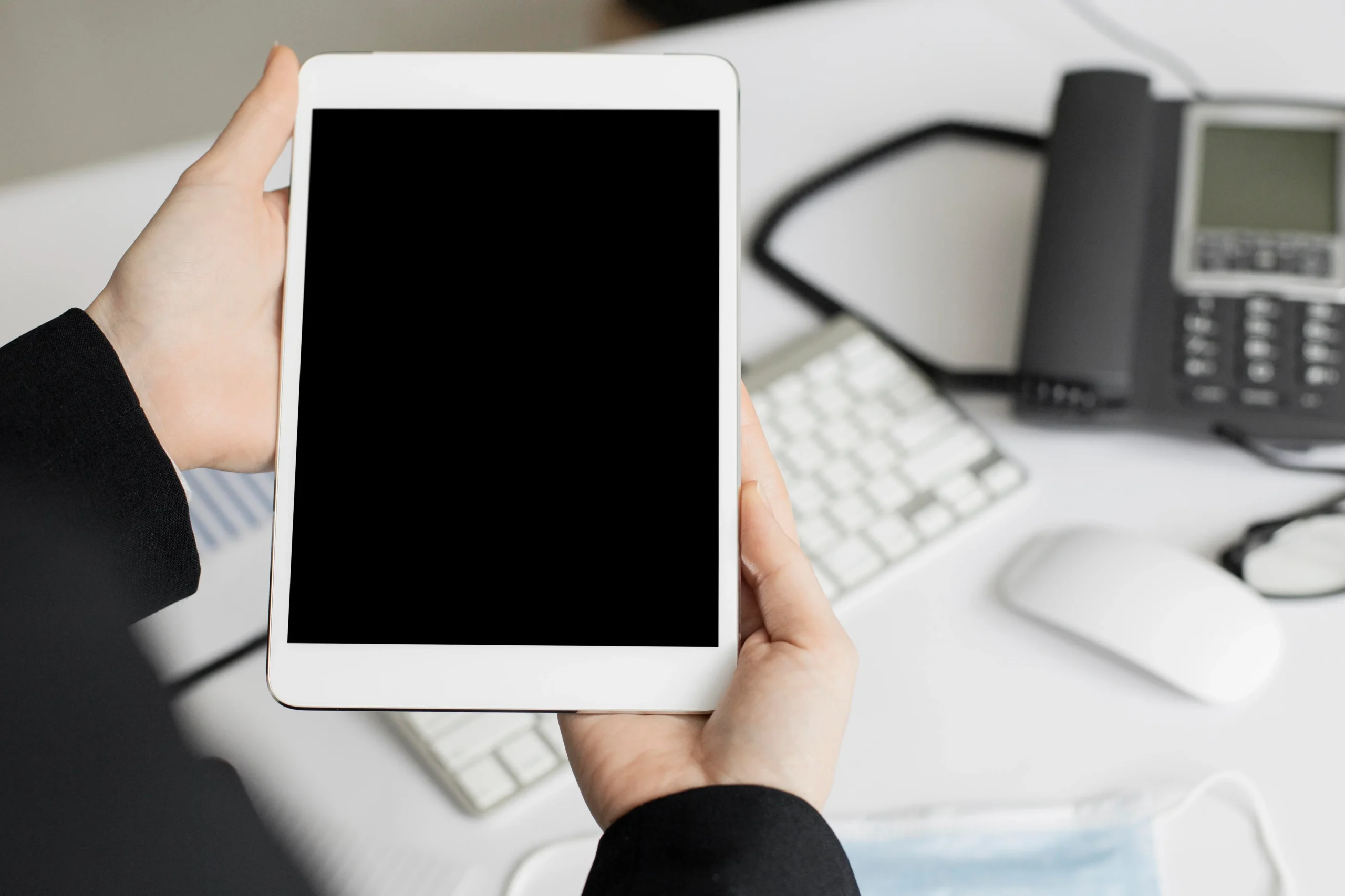 Teacher using iPad device management in a classroom