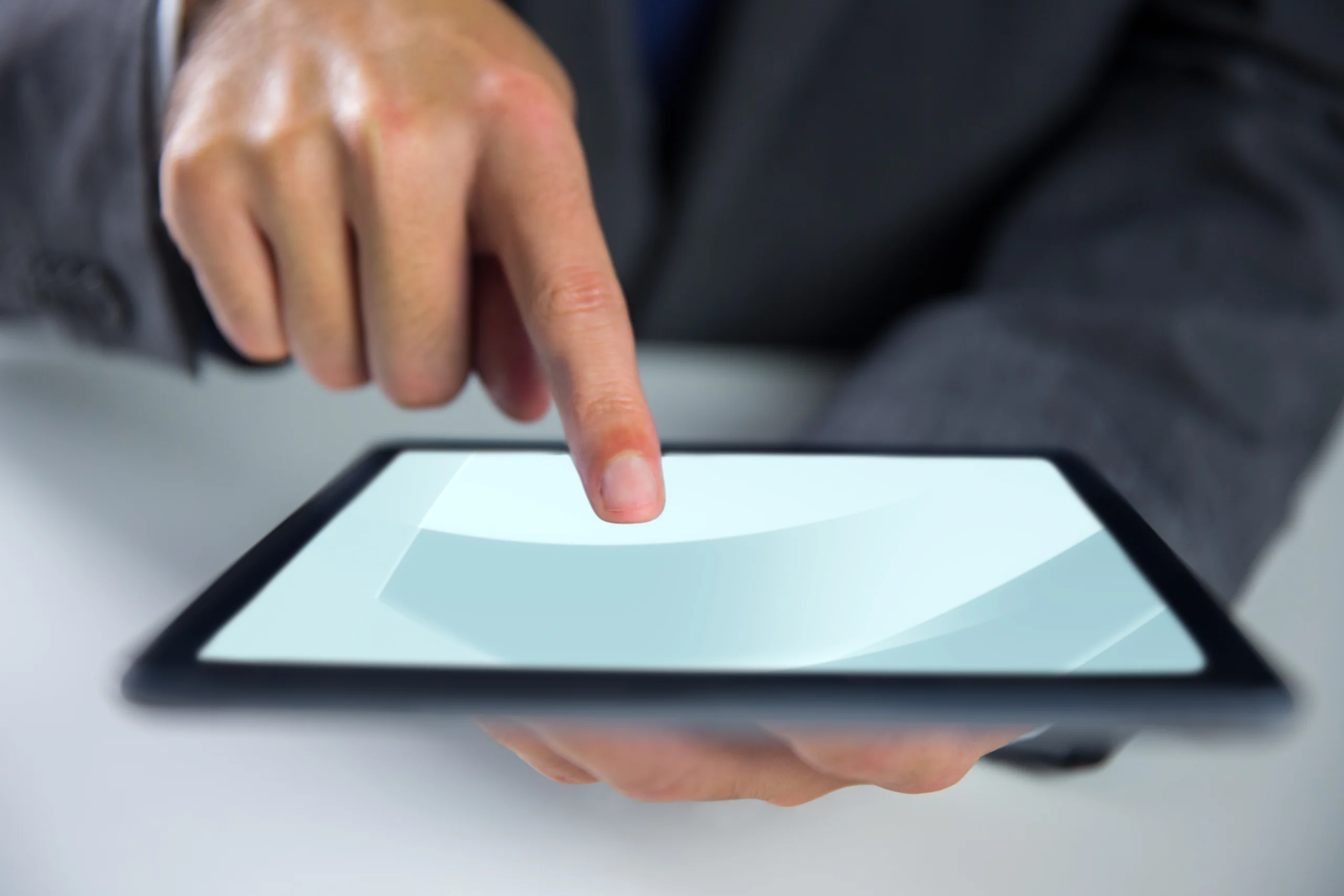 IT manager configuring iPad security policies remotely